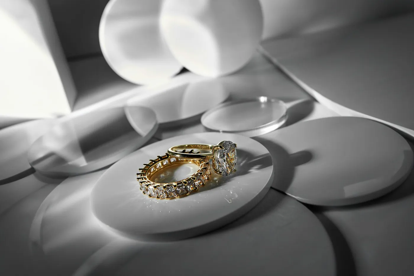 Fine jewellery arranged on a light surface